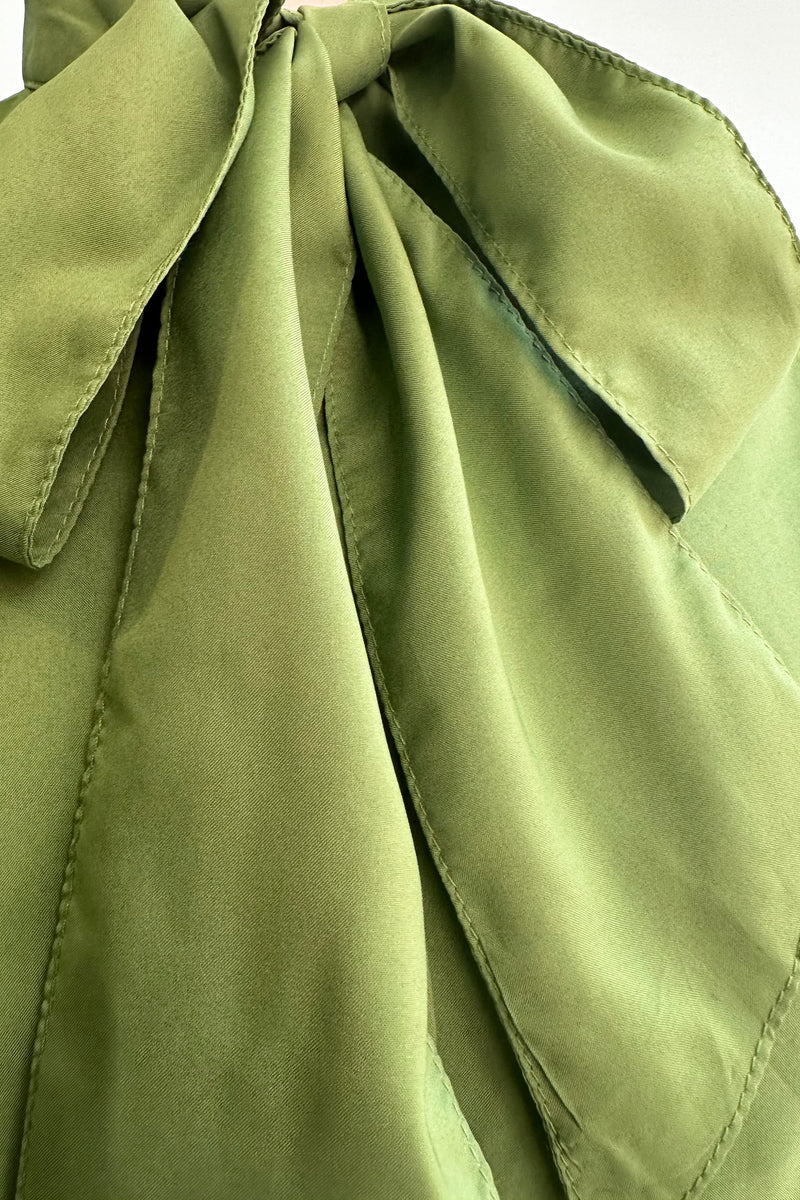 Green Sleeveless Tie Neck Top by Voodoo Vixen