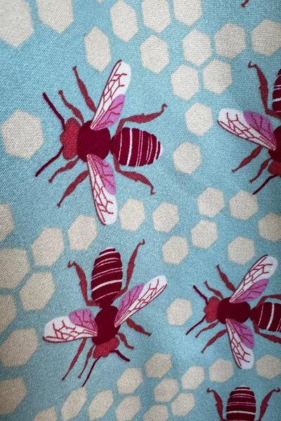 Pink and Light Blue Bee and Honeycomb Fold-Over Dress by Eva Rose