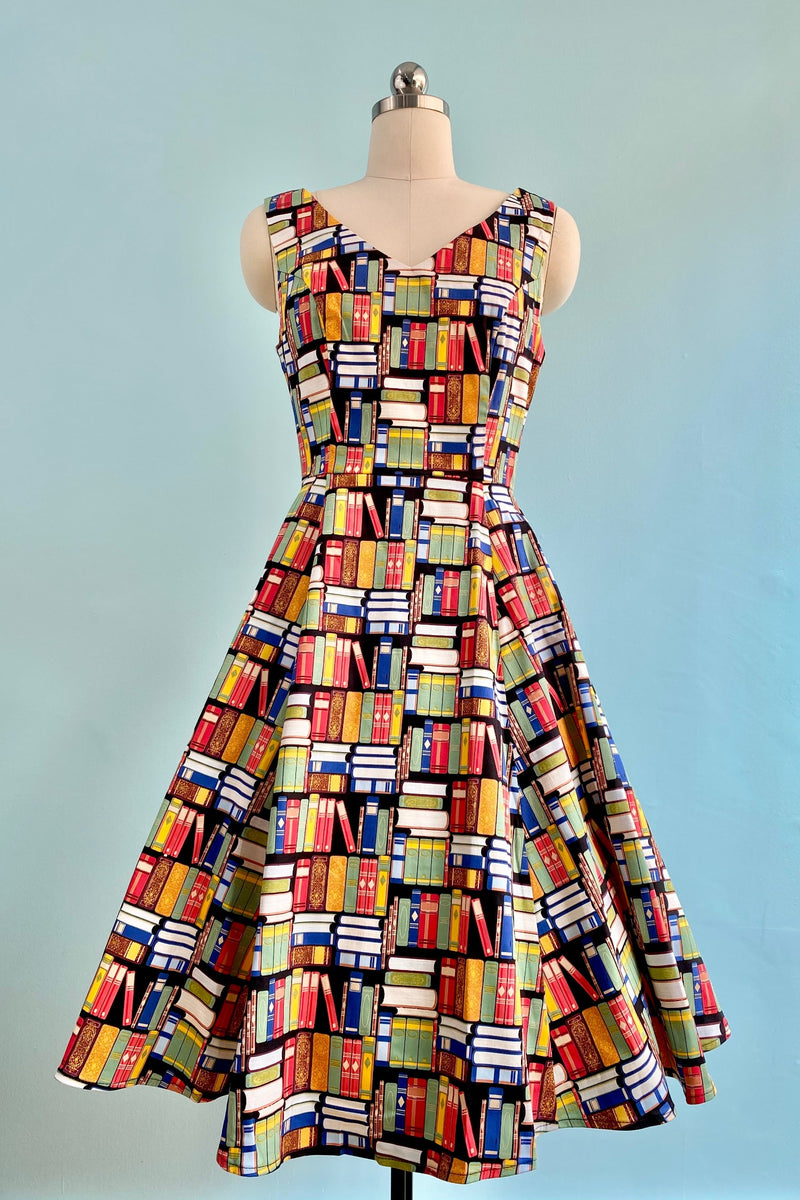 Book Print V-Neck Dress by Eva Rose