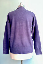 Large Pink Flower on a Navy Sweater by Compania Fantastica
