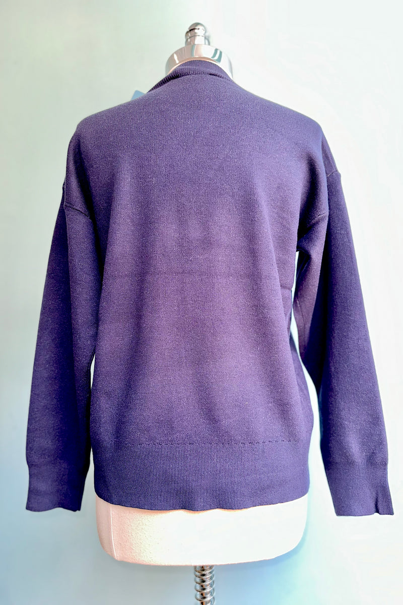 Large Pink Flower on a Navy Sweater by Compania Fantastica