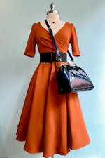 Burnt Orange Surplice Dress by Voodoo Vixen