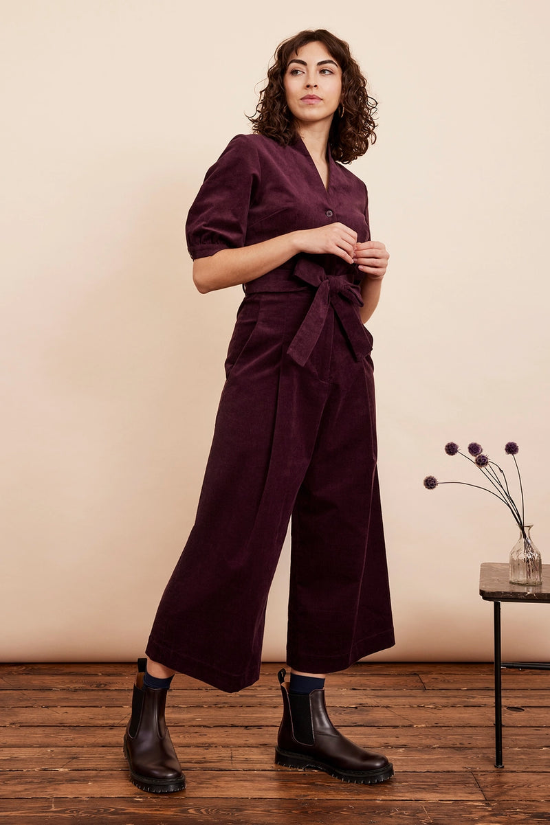 Stella Needlecord Jumpsuit in Plum by Emily and Fin