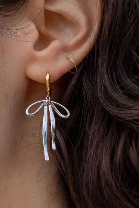 Silver Hoop Bad to the Bow Earrings by Peter and June