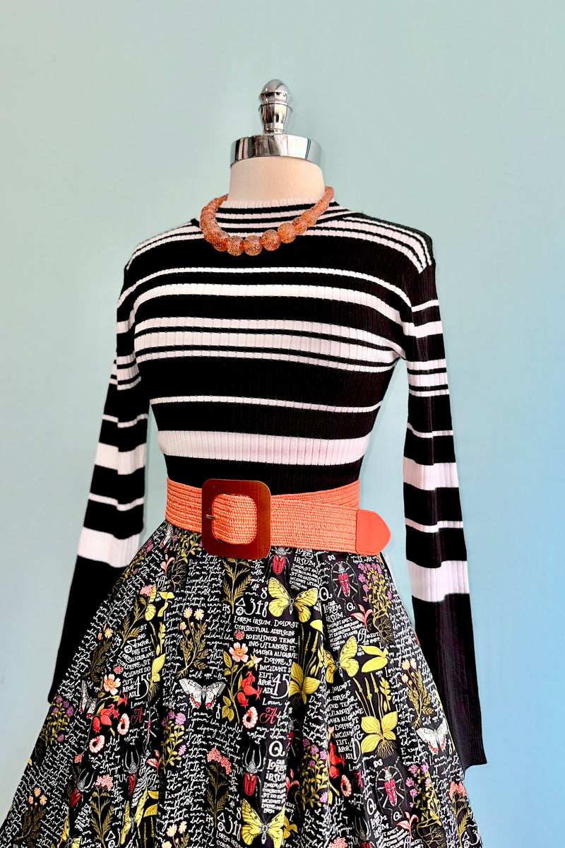 Black and White Striped Mock Neck Sweater by Voodoo Vixen