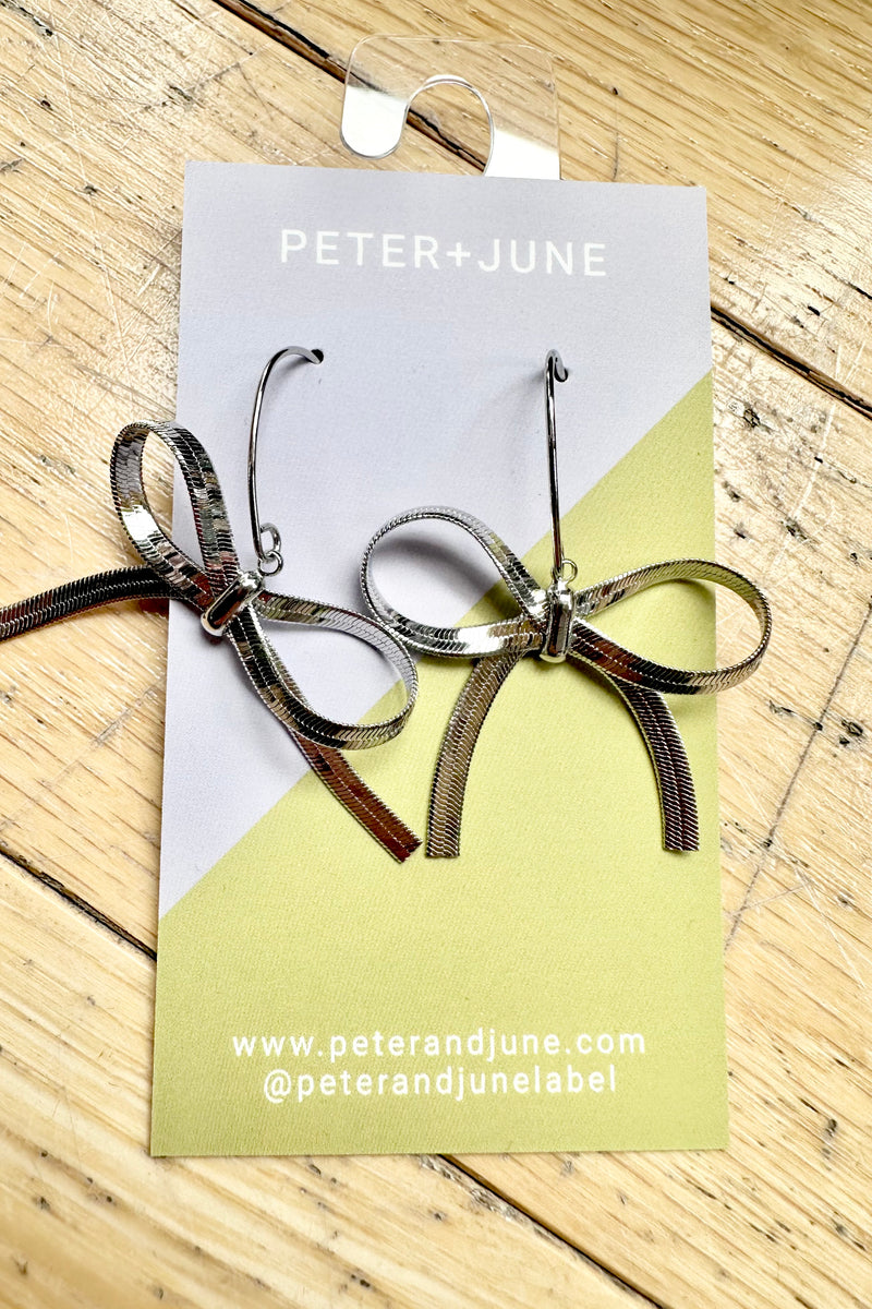 Silver Hot to Bow Earrings by Peter and June