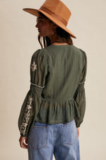 Embroidered Peplum Blouse in Deep Green