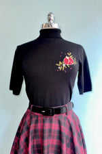 Pomegranate Turtleneck Sweater in Black by Banned