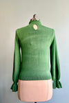 Rosemary Green Mock Neck Ruffle Trim Sweater