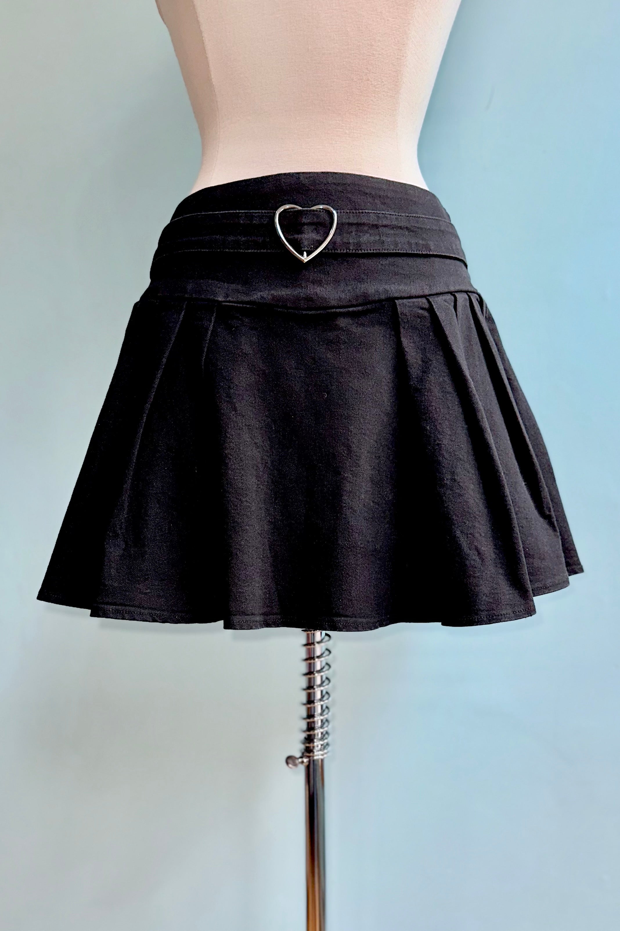 Black Pleated Denim Mini Skirt with a Heart Buckle by