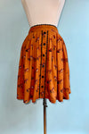 Vixey Pleated Mini Skirt in Caramel by Hell Bunny