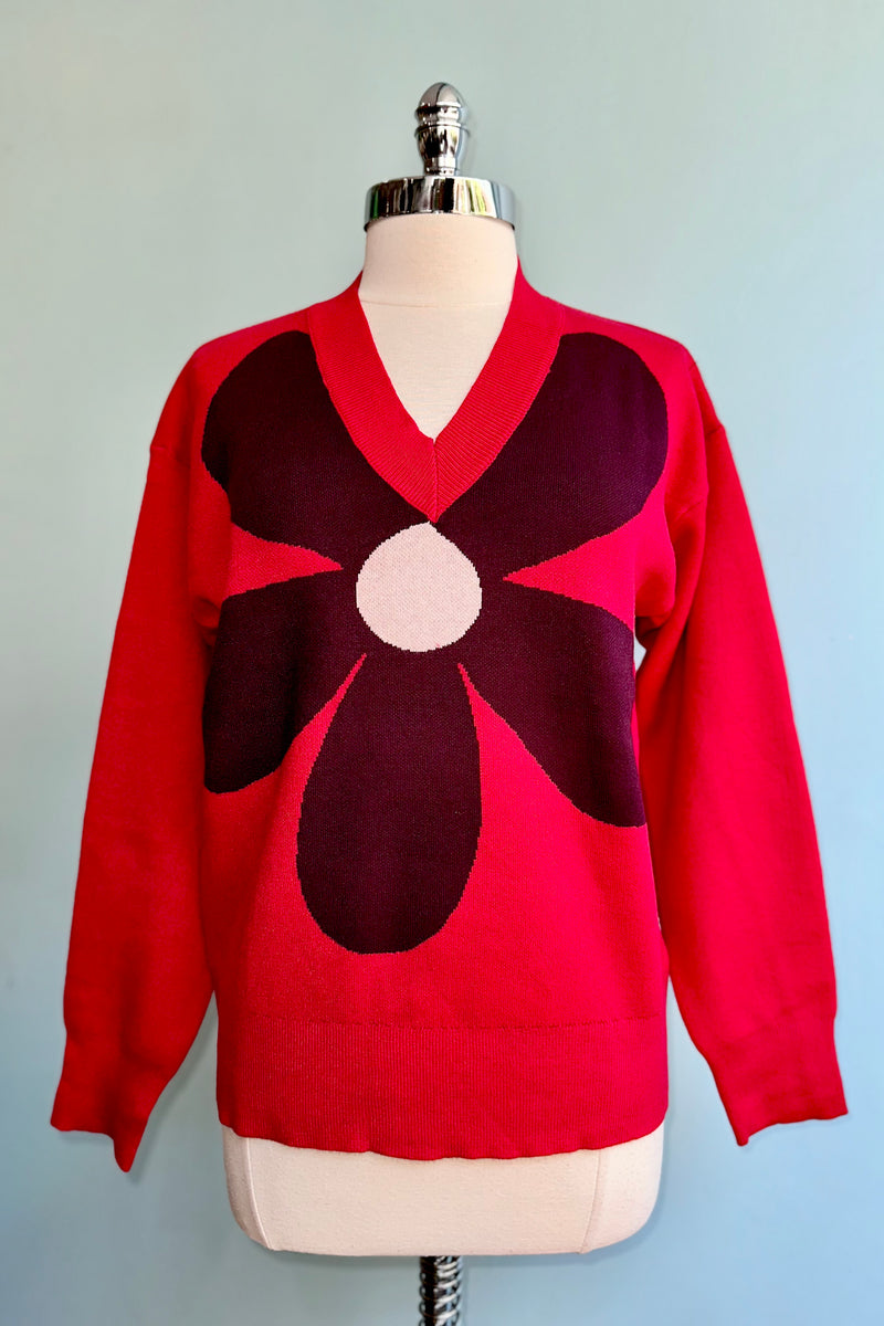 Large Burgundy Flower on a Red Sweater by Compania Fantastica
