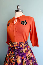 Orange Scaredy Cat Mia Cardigan by Banned