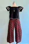 Burgundy Orchid Print Wide Leg Cropped Pants by Apsara