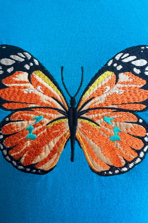 Butterfly Embroidered Pullover Knit Top by Voodoo Vixen