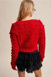 Red Pom Pom Cardigan with Black Velvet Bows