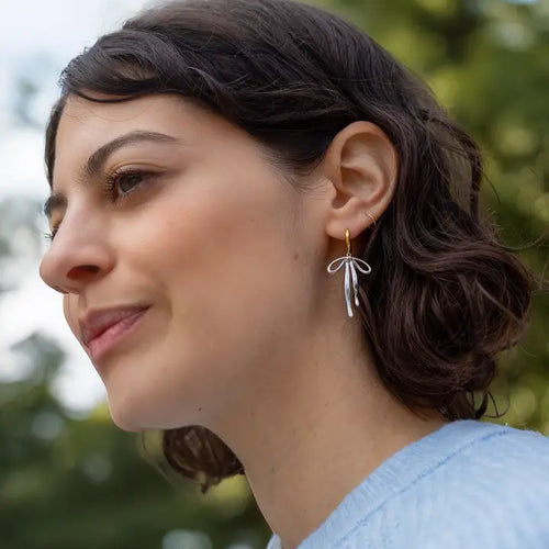 Silver Hoop Bad to the Bow Earrings by Peter and June