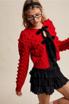 Red Pom Pom Cardigan with Black Velvet Bows