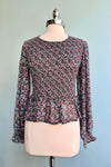 Floral Smocked Peplum Blouse by Molly Bracken