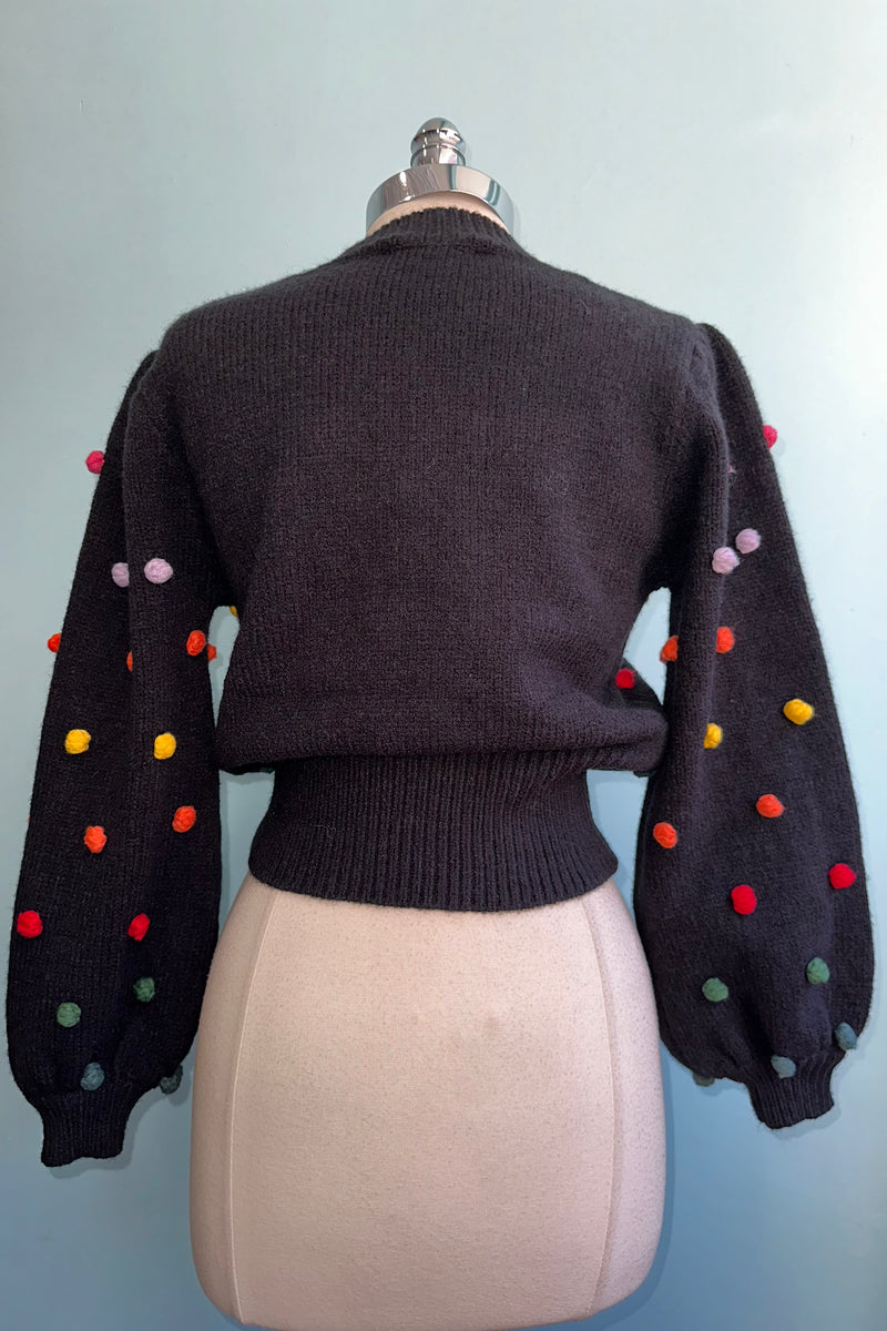 Black pom top pom sweater