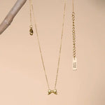 Tiny Bow Necklace by Peter and June