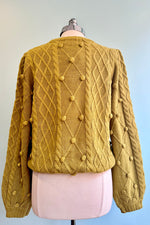 Lemon Grass Pom Pom Cable Knit Sweater