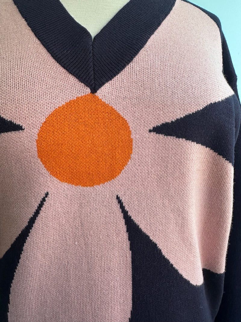 Large Pink Flower on a Navy Sweater by Compania Fantastica