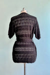 Crochet Belted Cardigan in Black by Molly Bracken