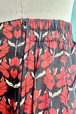 Burgundy Orchid Print Wide Leg Cropped Pants by Apsara