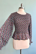 Floral Smocked Peplum Blouse by Molly Bracken