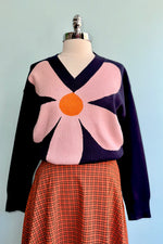 Large Pink Flower on a Navy Sweater by Compania Fantastica