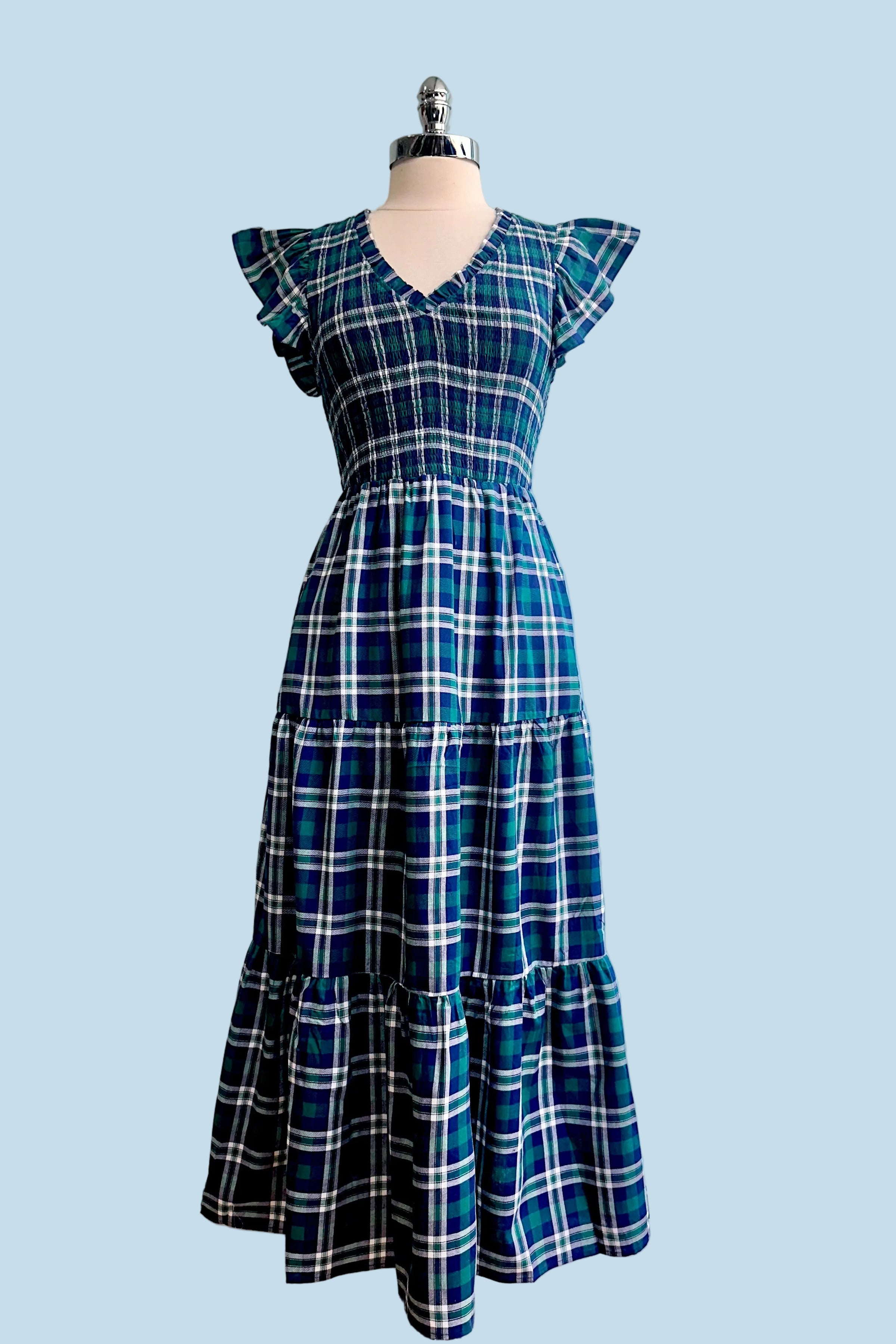nail color with dark green dress Blue Plaid Ruffle Sleeve Smocked Midi Dress – Modern Millie