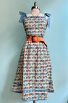 Cat Faces Tie Shoulder Smocked Midi Dress