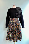 Black Rosette Sweater by Molly Bracken