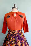 Orange Scaredy Cat Mia Cardigan by Banned