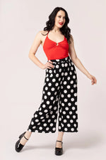 Dolores Wide Leg Cropped Pants in Black Polka-Dot by Hell Bunny