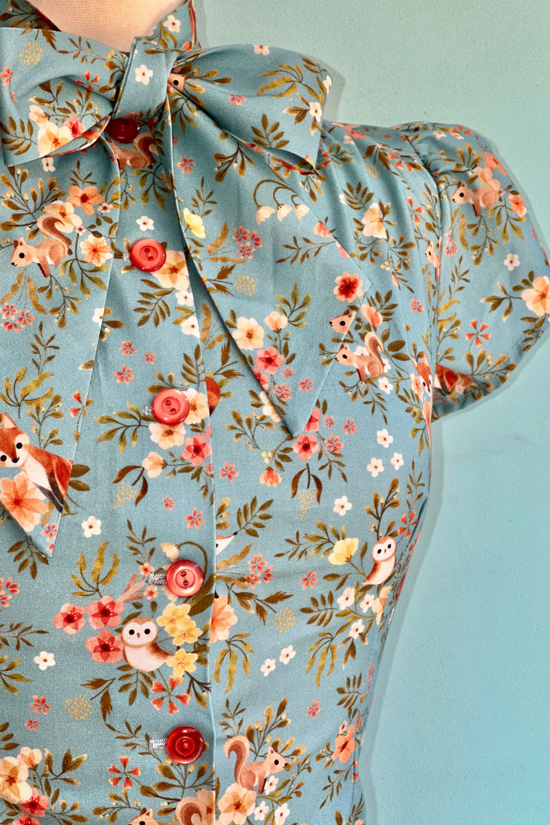 Light Blue Woodland Friends Estelle Tie-Neck Blouse by Heart of Haute