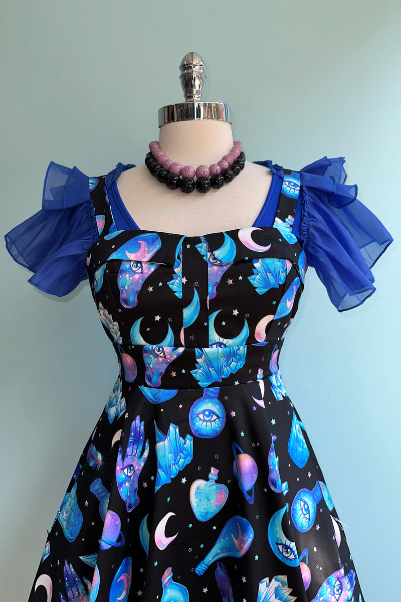 Mystical Black and Purple Fold-Over Dress by Eva Rose 1X-Large Mystical Black and Purple Fold-Over Dress by Eva Rose 1X-Large