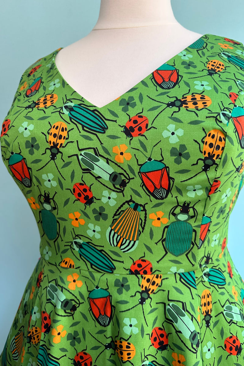 Green Bug V-Neck Dress by Eva Rose