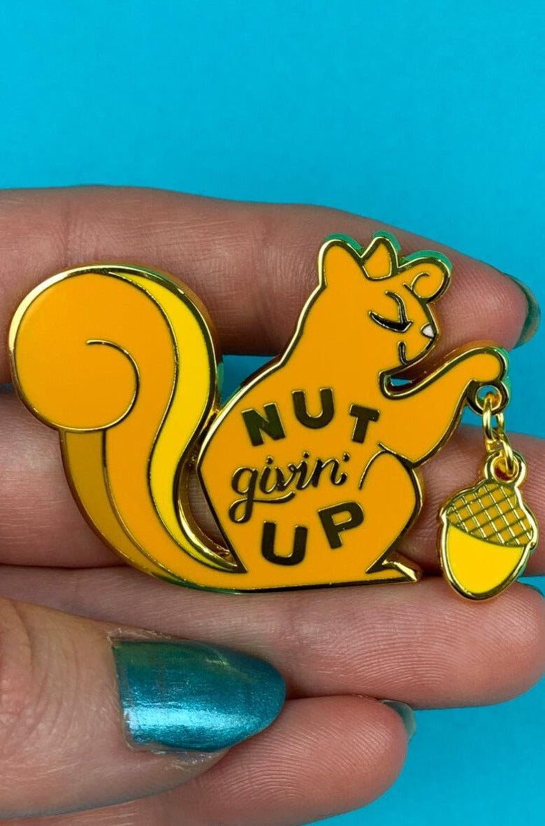 Nut Givin' Up Enamel Pin by Erstwilder