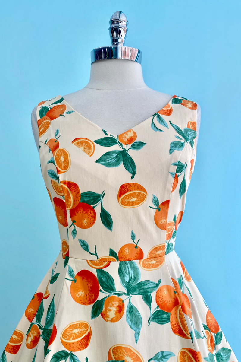 Oranges and Leaves V-Neck Dress by Eva Rose