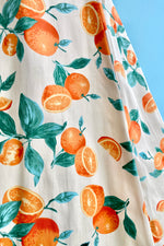 Oranges and Leaves V-Neck Dress by Eva Rose