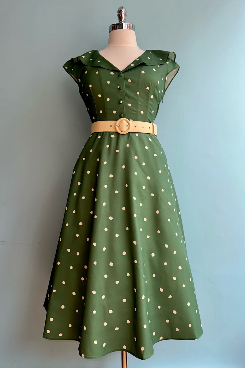 Green Dotted Ruffle Neck Dress by Voodoo Vixen