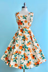 Oranges and Leaves V-Neck Dress by Eva Rose
