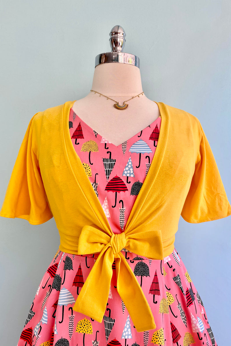 Peachy Umbrellas V-Neck Dress by Eva Rose