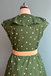 Green Dotted Ruffle Neck Dress by Voodoo Vixen