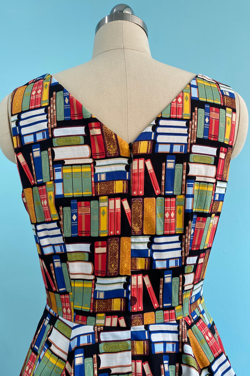 Book Print V-Neck Dress by Eva Rose