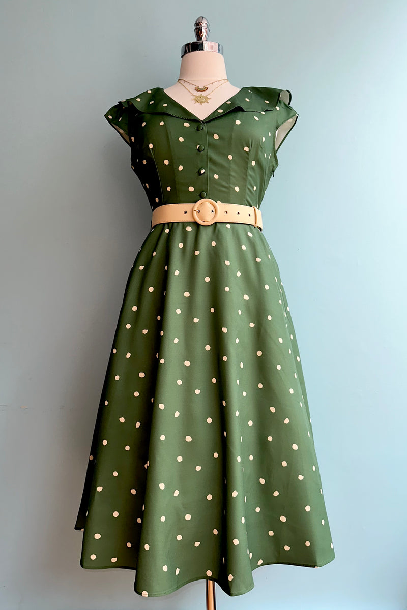 Green Dotted Ruffle Neck Dress by Voodoo Vixen