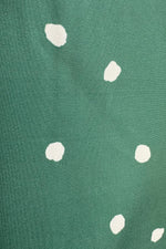 Green Dotted Ruffle Neck Dress by Voodoo Vixen